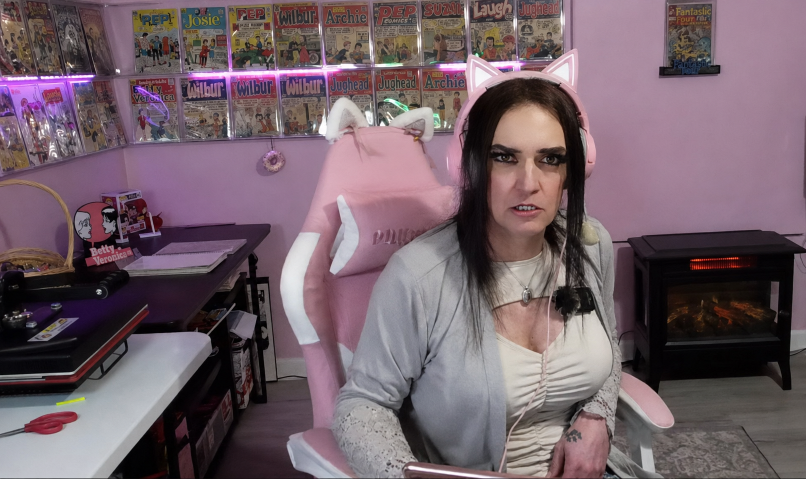 Ronnie appearing from the Pink Room during her Matt Likes Comics interview